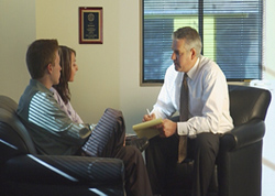 Lawyer Darin Schanker with clients