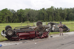 Car flipped in crash