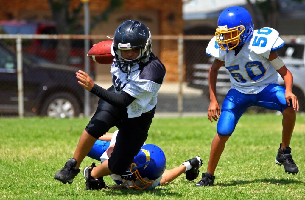 children in football helmets San Francisco 49ers Youth Helmet and Jersey Set by Franklin : Sports & Outdoors Protecting Your Kids with Safe