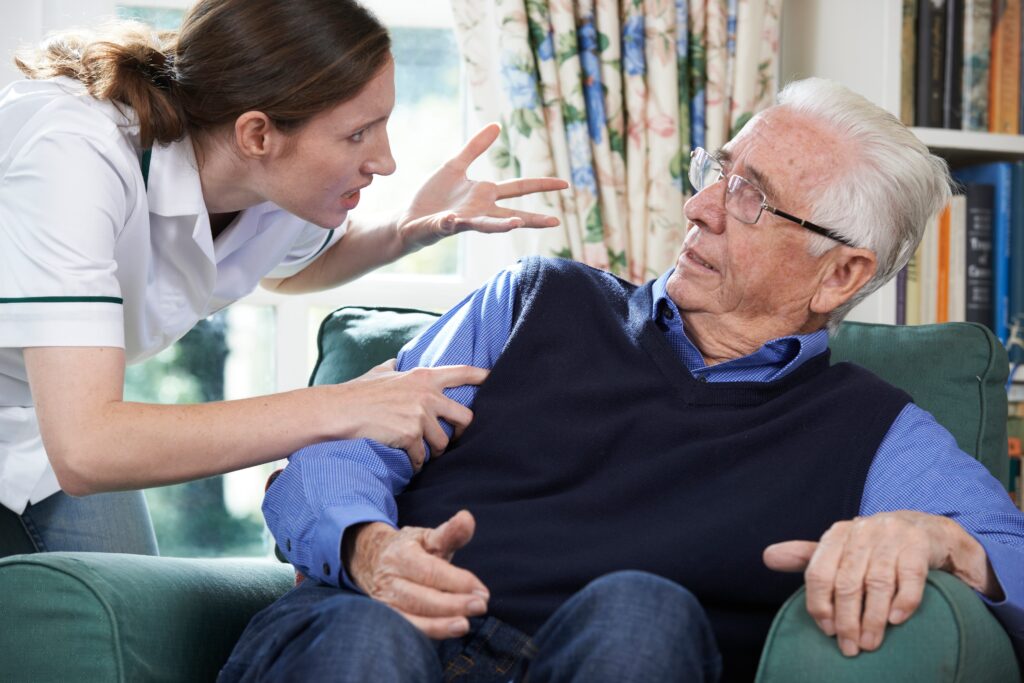 nurse yelling at elderly man