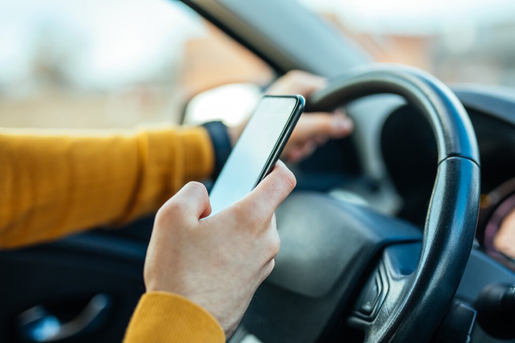 person on phone distracted driving