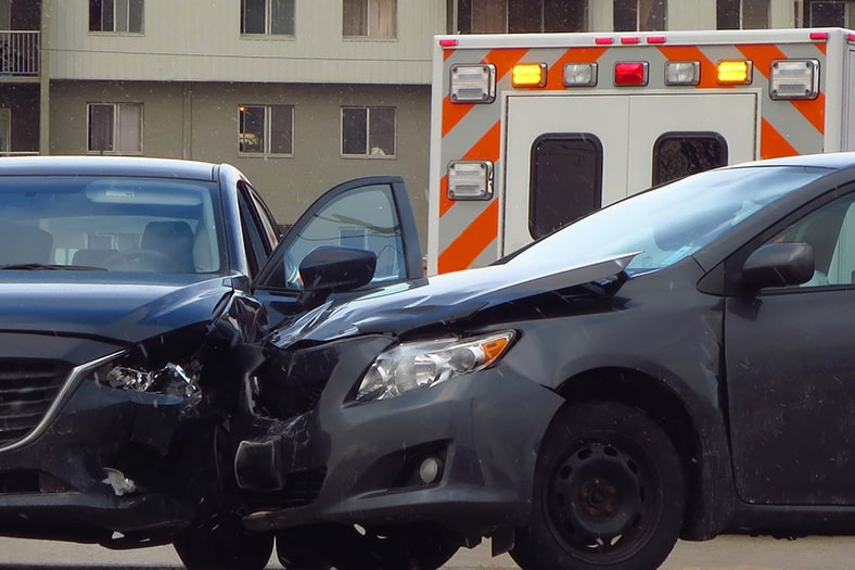 2 car accident collision with an ambulance that arrived to the scene in Fort Collins, Colorado.