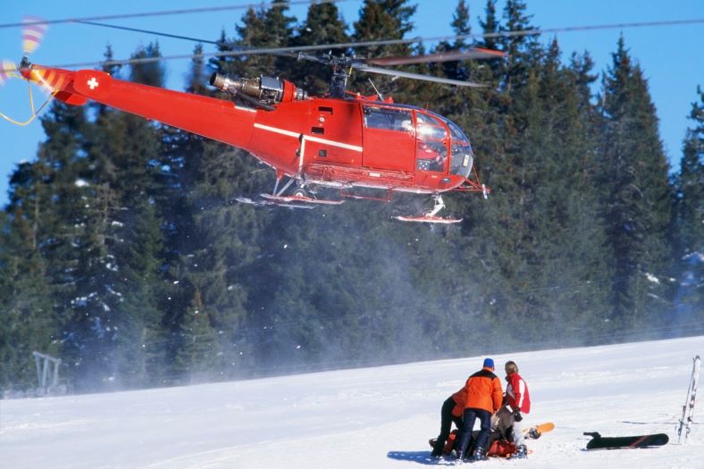 hit and run ski accident getting help from a rescue helicopter