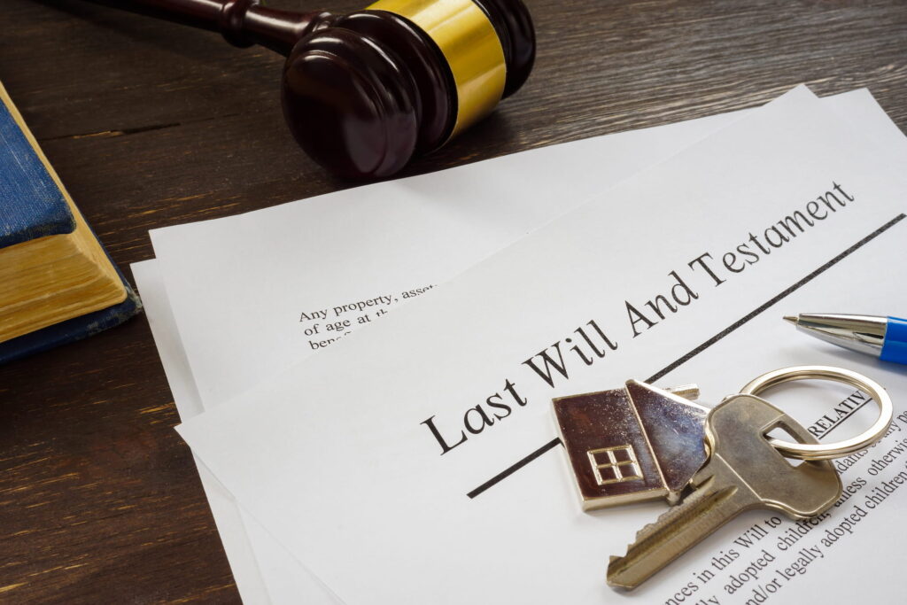 Last Will And Testament Documents Next To Keys And A Gavel