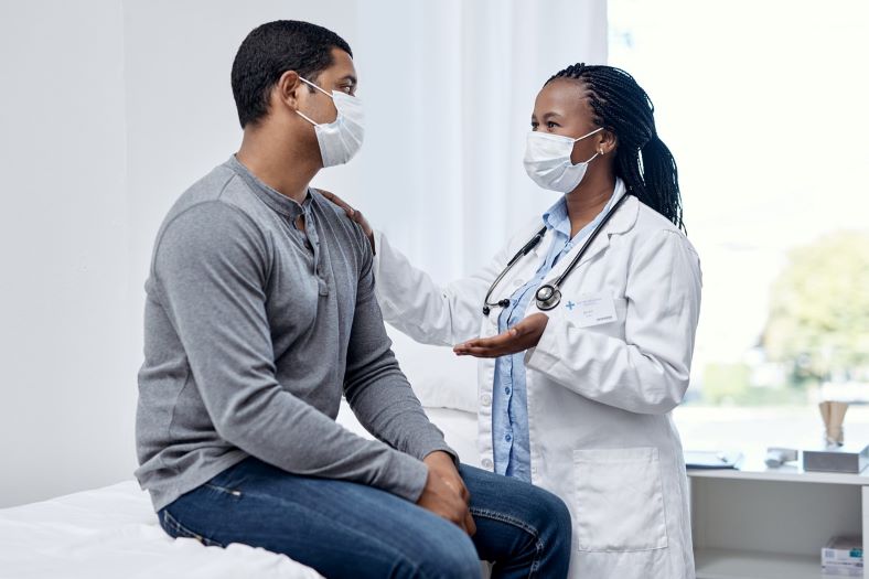 patient talking with doctor about his emotional trama from an accident