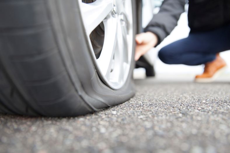 pothole causes flat tire