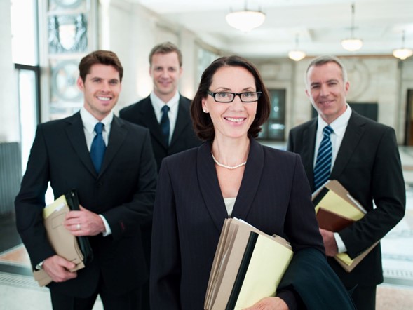 a group of four workers compensation attorneys