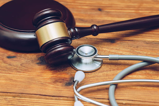 A stethoscope next to a gavel at a Colorado Springs personal injury law firm.