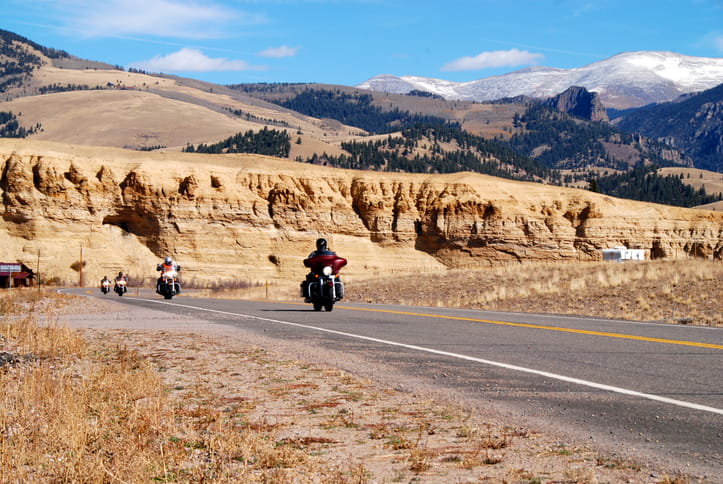 Motorcycles riding on a roadway in Colorado.