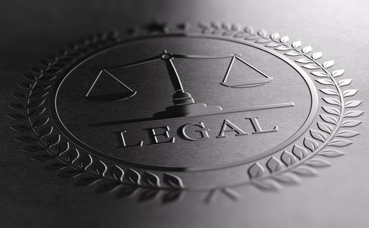 A silver seal that reads "Legal."