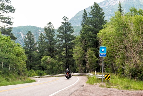 A person riding a motorcycle in Colorado.