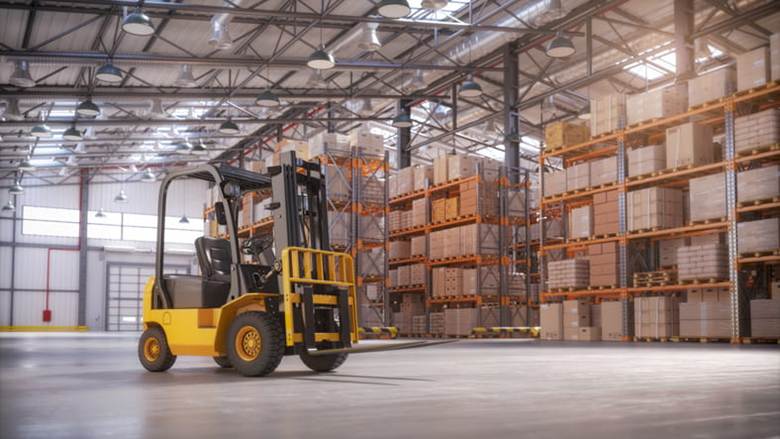 A forklift inside a warehouse.